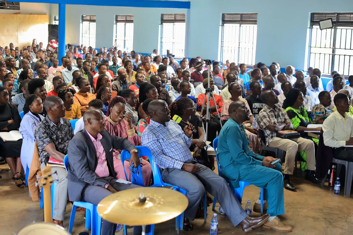 A wide view of the congregation seated during a gathering