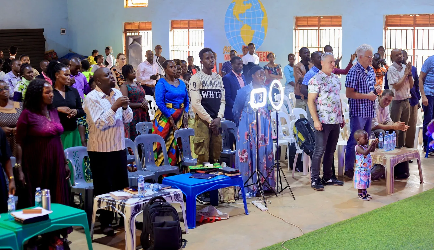 Members and visiting partners worshipping together