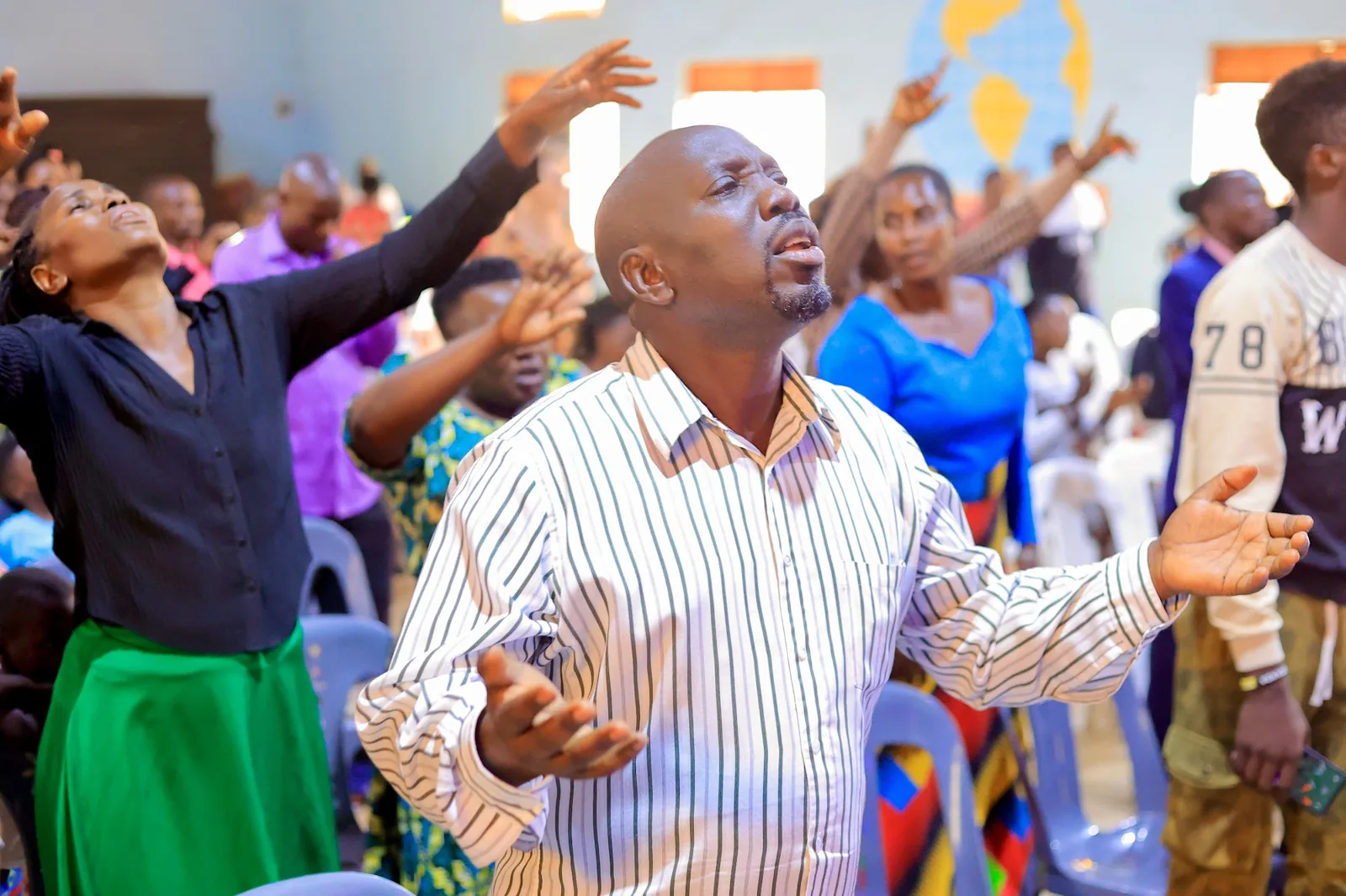Members of the ministry worshipping together